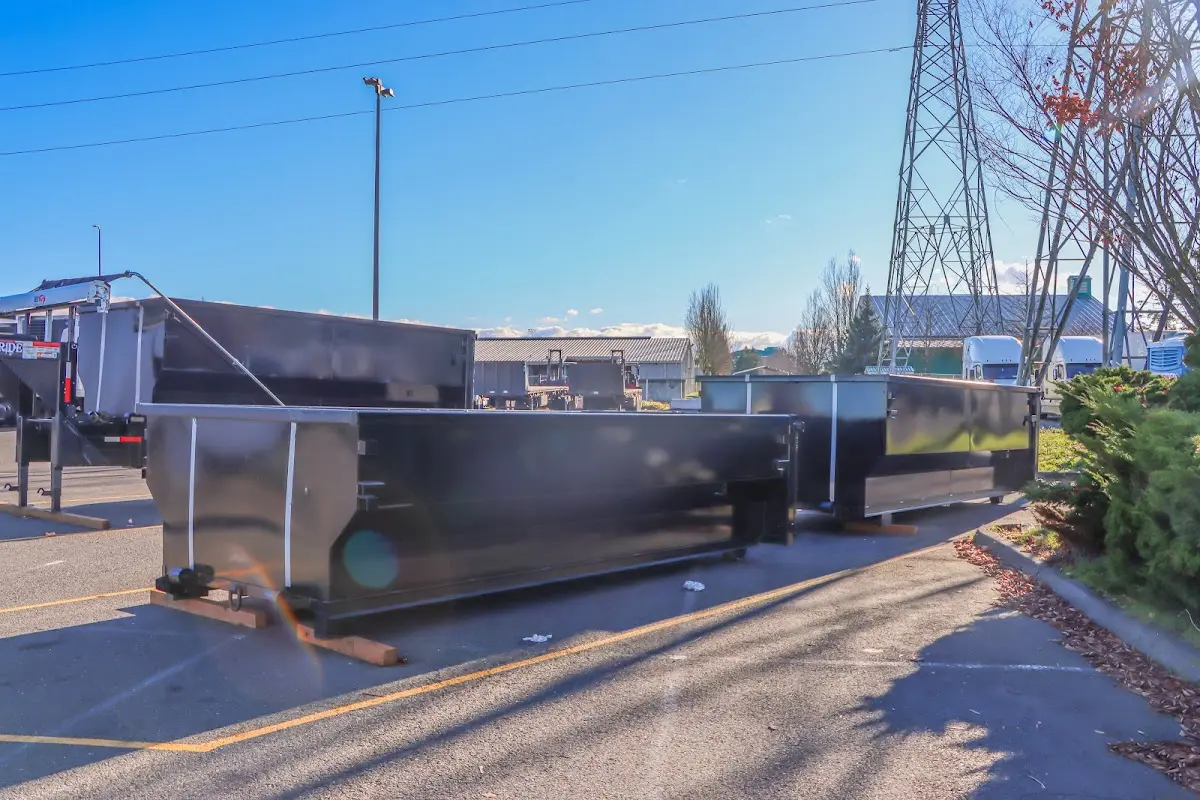 Roll-off dumpster ready for waste disposal at job site for 2 Yard Dumpster Rental in Austintown